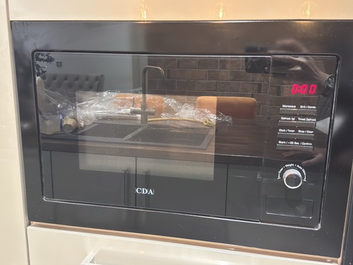 Built microwave oven - built,