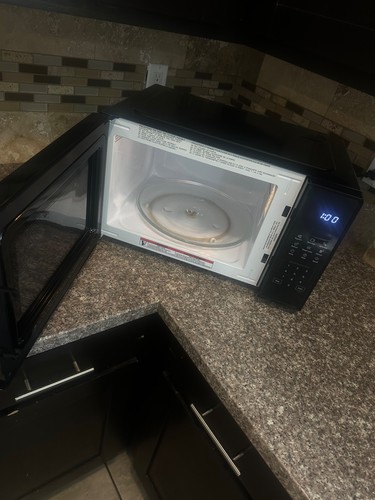 Brand new microwave never - brand,